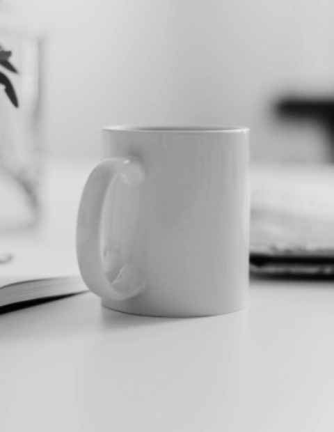 A coffee cup placed on a desk.