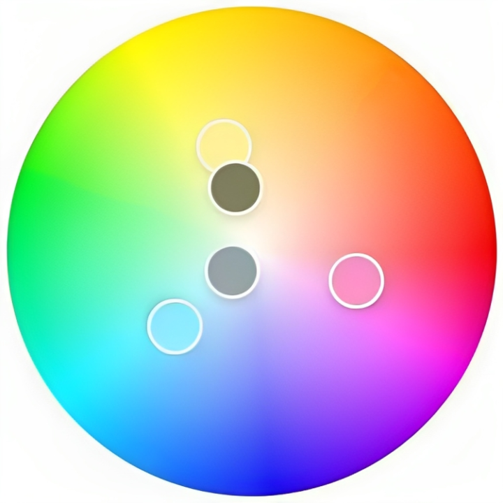 A circular rainbow color wheel that highlights a "triangle color scheme" featuring pastel green, blue, pink, and yellow.