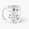 Ceramic flower mug featuring a wraparound white and pink floral pattern design. Designed by Zuzanii Designs.