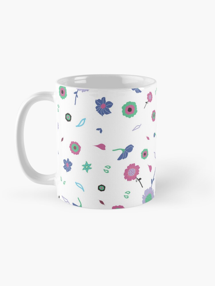 Ceramic flower mug featuring a wraparound white and pink floral pattern design. Designed by Zuzanii Designs.