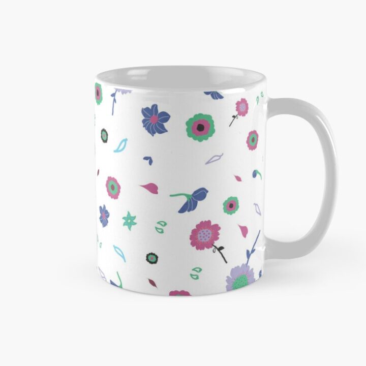 Ceramic flower mug featuring a wraparound white and pink floral pattern design. Designed by Zuzanii Designs.