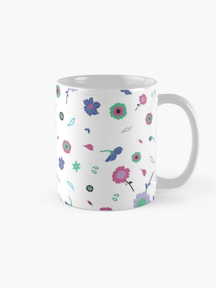 Ceramic flower mug featuring a wraparound white and pink floral pattern design. Designed by Zuzanii Designs.