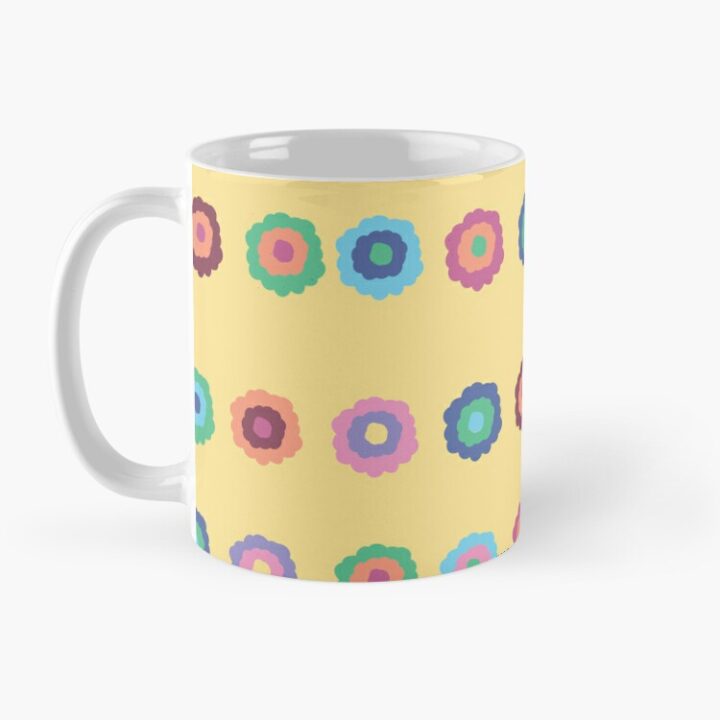 Ceramic flower mug featuring a wraparound bright summer yellow floral pattern design. Designed by Zuzanii Designs.