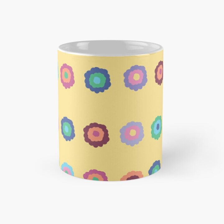 Ceramic flower mug featuring a wraparound bright summer yellow floral pattern design. Designed by Zuzanii Designs.
