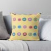 A throw pillow featuring an original bright summer yellow floral pattern, made with a 100% spun polyester cover. One of many floral pillowcases designed by independent artist Zuzanii Designs.