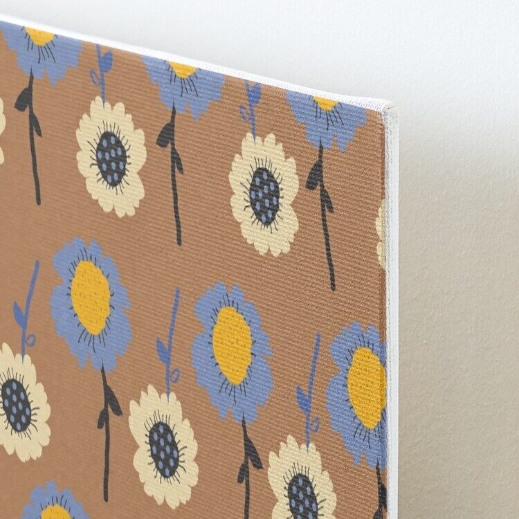 Close up on mounted canvas of a brown and blue floral Surface Pattern Design.